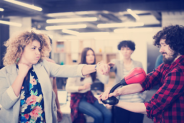 Image showing multiethnics business team boxing at office