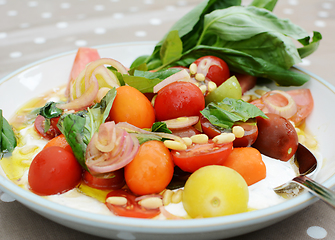 Image showing Mixed tomato salad with colourful cherry tomatoes
