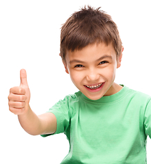 Image showing Little boy is showing thumb up sign