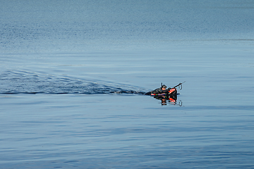 Image showing fisher swimming for fish