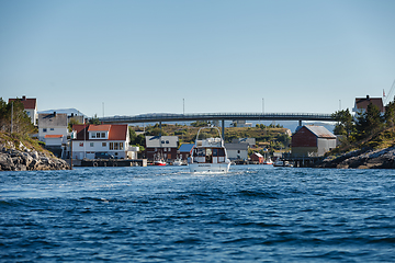 Image showing view on norwegian fjord with houses along coastline