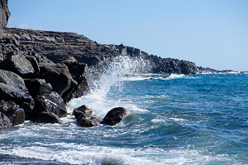 Image showing beautiful wild beach with black sand