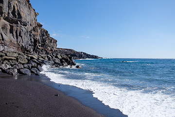 Image showing beautiful wild beach with black sand