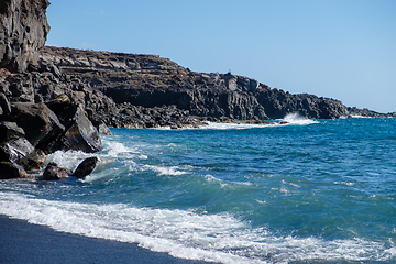 Image showing beautiful wild beach with black sand