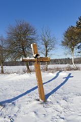 Image showing old wooden sagging cross