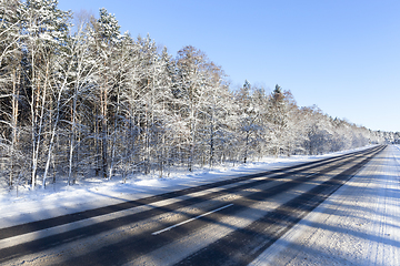 Image showing photo of a diagonal asphalt road