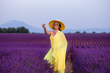 Image showing asian woman in yellow dress and hat at lavender field