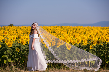 Image showing asian woman at sunflower field