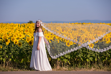 Image showing asian woman at sunflower field