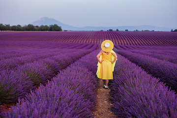 Image showing asian woman in yellow dress and hat at lavender field