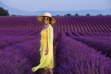 Image showing asian woman in yellow dress and hat at lavender field