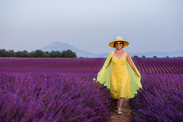 Image showing asian woman in yellow dress and hat at lavender field