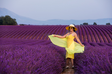Image showing asian woman in yellow dress and hat at lavender field