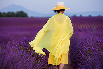 Image showing asian woman in yellow dress and hat at lavender field