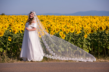 Image showing asian woman at sunflower field