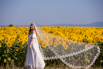 Image showing asian woman at sunflower field