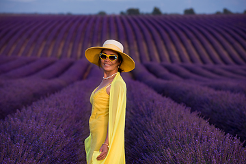 Image showing asian woman in yellow dress and hat at lavender field