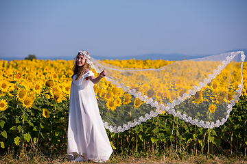 Image showing asian woman at sunflower field