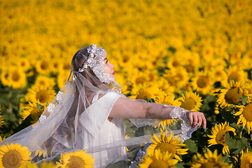 Image showing asian woman at sunflower field