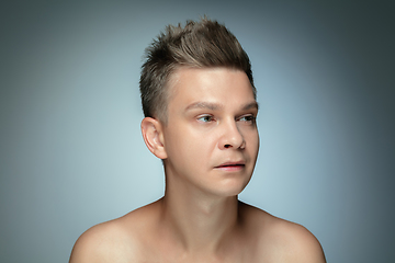 Image showing Portrait of shirtless young man isolated on grey studio background