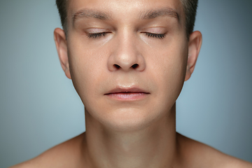 Image showing Portrait of shirtless young man isolated on grey studio background