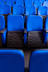 Image showing hall with rows of blue seats