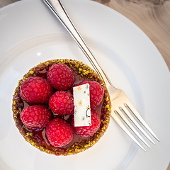 Image showing sweet raspberry tart with fork