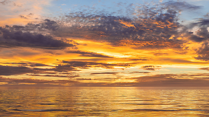 Image showing sunset sky at the ocean background