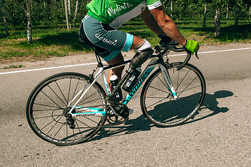 Image showing Dnipro, Ukraine - July 12, 2019: athlete with disabilities or amputee training in cycling