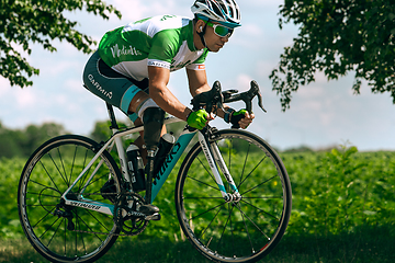 Image showing Dnipro, Ukraine - July 12, 2019: athlete with disabilities or amputee training in cycling