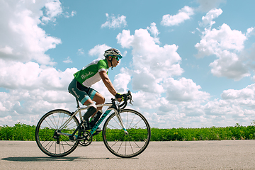 Image showing Dnipro, Ukraine - July 12, 2019: athlete with disabilities or amputee training in cycling