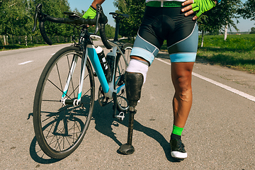 Image showing Athlete disabled amputee training in cycling