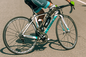 Image showing Dnipro, Ukraine - July 12, 2019: athlete with disabilities or amputee training in cycling