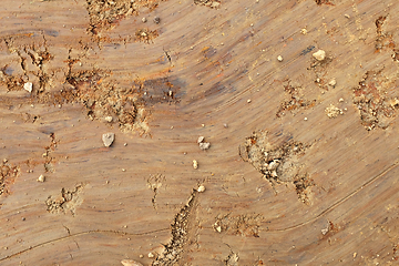 Image showing Weathered Weald clay surface background, scraped smooth by excav