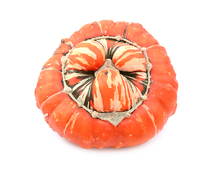 Image showing Ribbed and warty orange turban squash with striped, lobed centre