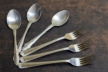 Image showing Cutlery is on the old table