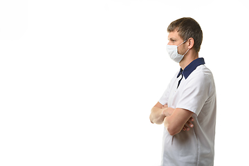 Image showing Portrait of a doctor with his arms folded on his chest in profile, to the left of the doctor there is an empty space for the inscription