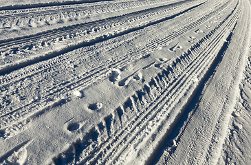 Image showing traces of the car on the road