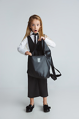 Image showing Girl preparing for school after a long summer break. Back to school.