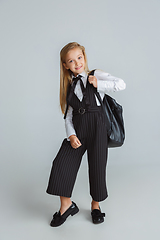 Image showing Girl preparing for school after a long summer break. Back to school.