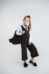 Image showing Girl preparing for school after a long summer break. Back to school.