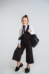 Image showing Girl preparing for school after a long summer break. Back to school.