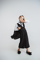 Image showing Girl preparing for school after a long summer break. Back to school.