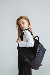 Image showing Girl preparing for school after a long summer break. Back to school.