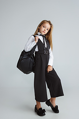 Image showing Girl preparing for school after a long summer break. Back to school.