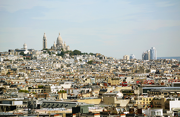 Image showing Sacre Coeur basilica and Chateau d\'eau Montmartre on the hill