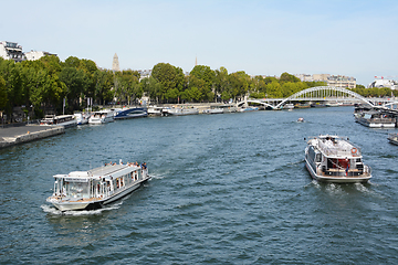 Image showing Tourist boat and Batobus ferry sail the Seine in Paris