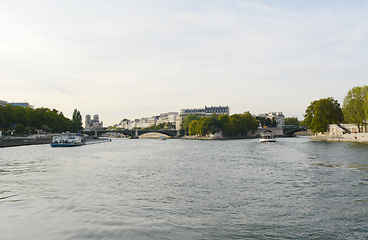 Image showing View northwest on the Seine towards the damaged Notre Dame cathe