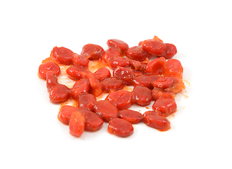 Image showing Bitter melon seeds covered in sticky red pith 