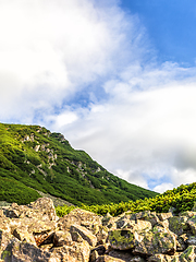 Image showing Polish Tatra mountains summer landscape with blue sky and white clouds.